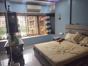 Bedroom in 2 BHK Apartment at Evershine Greens, Andheri West – for Rent