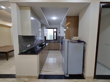 Kitchen in 2 BHK Apartment at Sector 23a Yamuna Expressway – for Rent