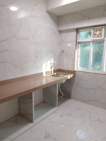 Kitchen in 2 BHK Apartment at Rajgir Park CHS, Borivali West – for Sale
