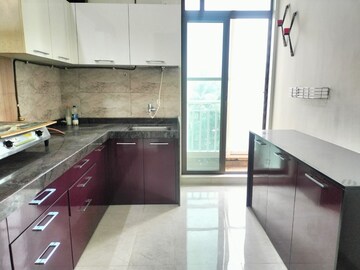 Kitchen in 3 BHK Apartment at Harmony Sky Suites, Ghodbunder Road – for Rent