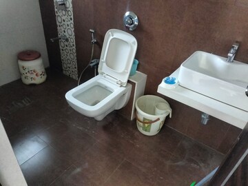 Bathroom in 3 BHK Apartment at Harmony Sky Suites, Ghodbunder Road – for Rent