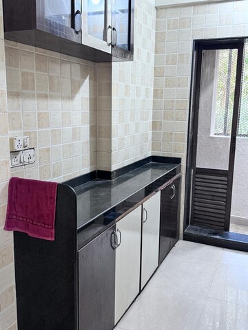 Kitchen in 3 BHK Apartment at Hiral Greens, Mira Road – for Sale