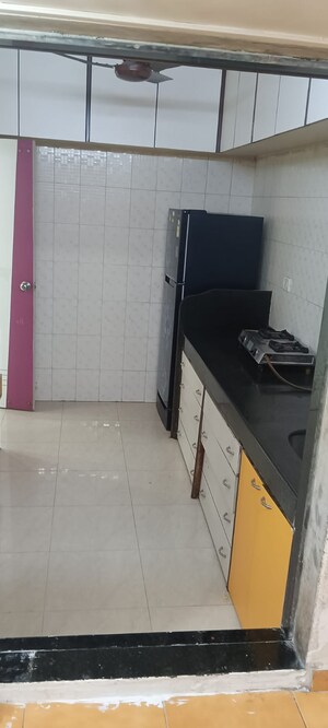 Kitchen in 2 BHK Apartment at Garden View CHS Andheri, Andheri West – for Sale