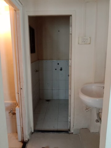 Bathroom in 1 BHK Apartment at New Mhada Tower, Malad West – for Rent