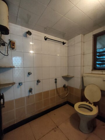 Attached Bathroom in 2 BHK Apartment at Vishnu Nagar – for Rent