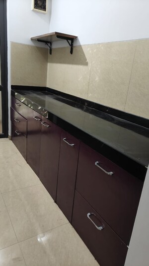 Kitchen in 1.5 BHK Apartment at Lodha Palava City, Dombivli East – for Sale