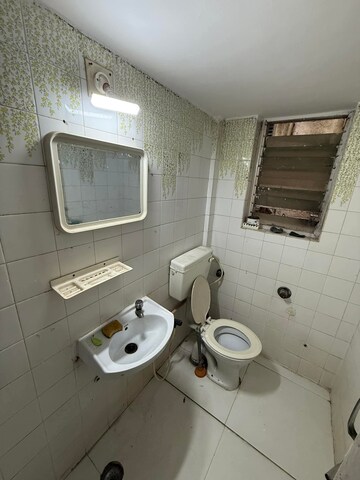 Bathroom in 1 BHK Apartment at Lokhandwala Complex – for Rent