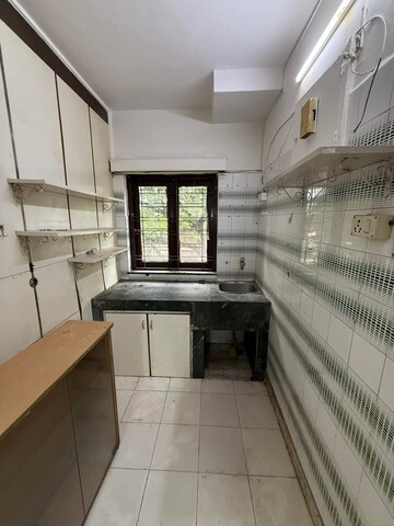 Kitchen in 1 BHK Apartment at Lokhandwala Complex – for Rent