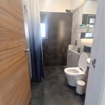 Bathroom in 2 BHK Apartment at Raheja Sherwood, Sonawala Industry Estate – for Rent