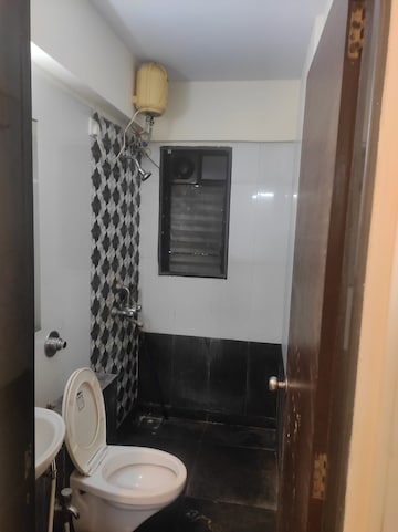 Bathroom in 2 BHK Apartment at Jeevansheela CHS, Bandra East – for Rent