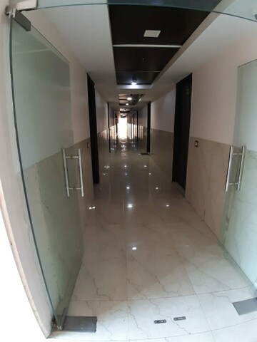 Building Lobby in 1 RK Apartment at Ansal API Esencia, Sector 67 – for Rent