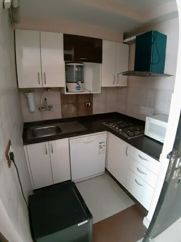 Kitchen in 1 RK Apartment at Ansal API Esencia, Sector 67 – for Rent
