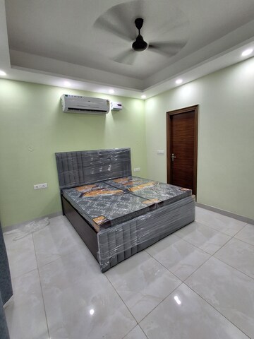 Bedroom in 4 BHK Builder Floor at Ansal Sushant Lok I, Sector 43 – for Rent