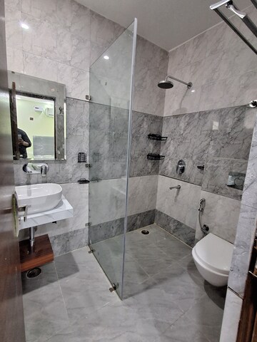 Bathroom in 4 BHK Builder Floor at Ansal Sushant Lok I, Sector 43 – for Rent
