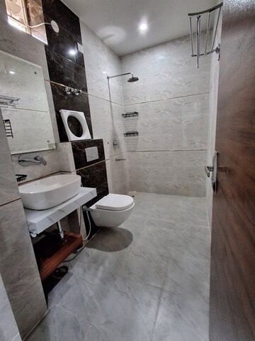 Bathroom in 4 BHK Builder Floor at Ansal Sushant Lok I, Sector 43 – for Rent