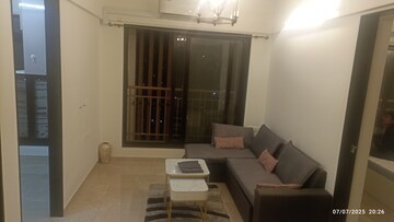 Living Room in 2 BHK Apartment at MICL Aaradhya Highpark, Mira Road – for Rent