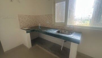 Kitchen in 2.5 BHK Apartment at ROF Ananda, Sector 95 – for Sale