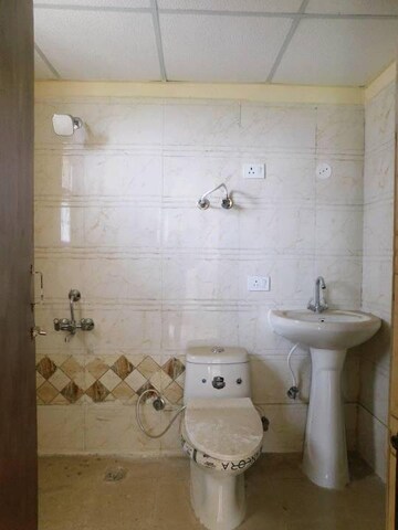 Bathroom in 2 BHK Apartment at Amrapali Kingswood, Sector 4 Greater Noida – for Sale