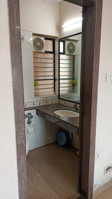 Master Bedroom in 2 BHK Apartment at Satellite Tower, Goregaon East – for Rent