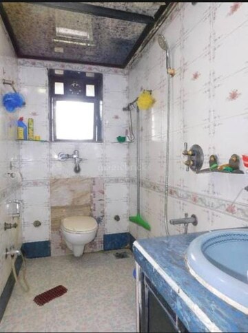 Bathroom in 3 BHK Apartment at Vikash Complex CHS, Uthalsar – for Sale