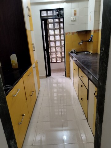 Kitchen in 1 BHK Apartment at Kshitij CHS, Goregaon East – for Sale