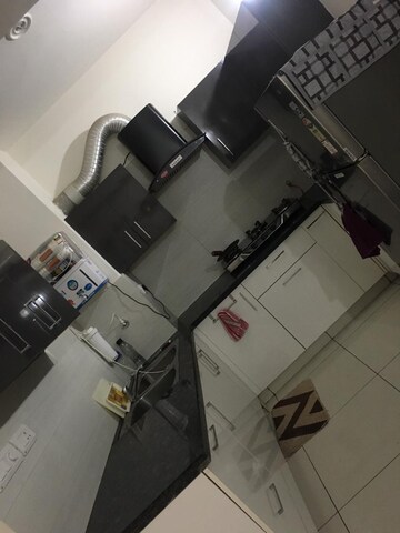 Kitchen in 2 BHK Apartment at Jaipuria Sunrise Green, Lohgarh – for Rent