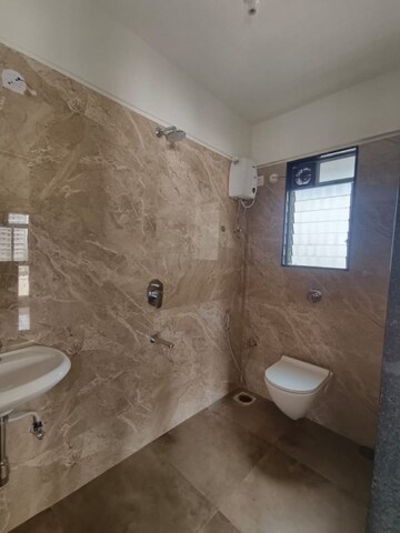 Bathroom in 1 BHK Apartment at Romell Serene, Borivali West – for Rent
