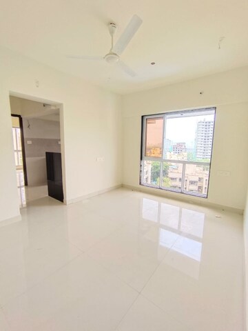 Room in 1 BHK Apartment at Romell Serene, Borivali West – for Rent