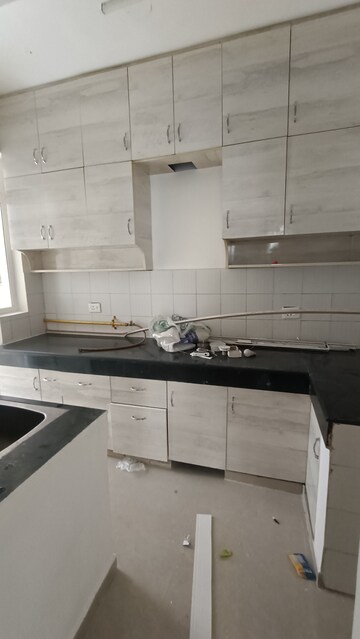 Kitchen in 2 BHK Apartment at Aditya Urban Casa, Sector 78 – for Rent