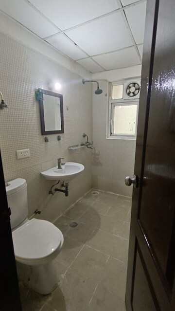 Bathroom in 2 BHK Apartment at Aditya Urban Casa, Sector 78 – for Rent