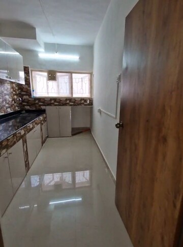 Kitchen in 3 BHK Apartment at Rose Sadan Apartment, Bandra West – for Rent