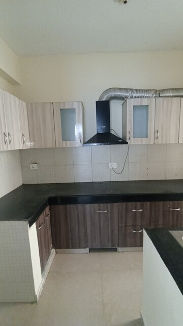 Kitchen in 2 BHK Apartment at Aditya Urban Casa, Sector 78 – for Rent