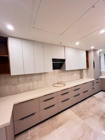 Kitchen in 4 BHK Apartment at Mahagun Mezzaria, Sector 78 – for Rent