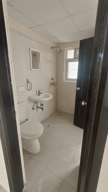 Bathroom in 2 BHK Apartment at Aditya Urban Casa, Sector 78 – for Rent
