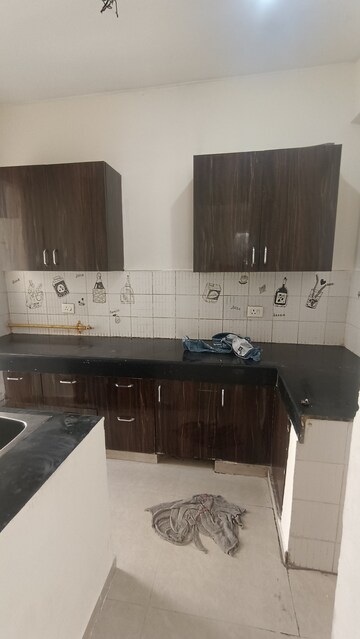 Kitchen in 2 BHK Apartment at Aditya Urban Casa, Sector 78 – for Rent