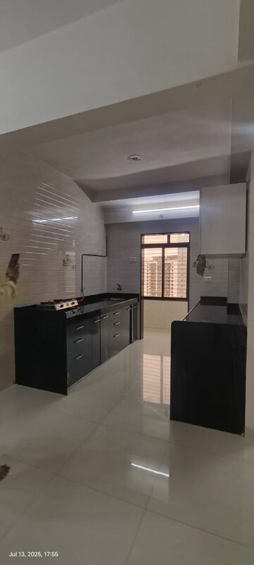 Kitchen in 3 BHK Apartment at Mahadev Samarth Garden, Bhandup West – for Rent