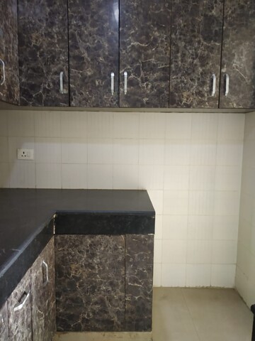 Kitchen in 2 BHK Apartment at Aditya Urban Casa, Sector 78 – for Rent
