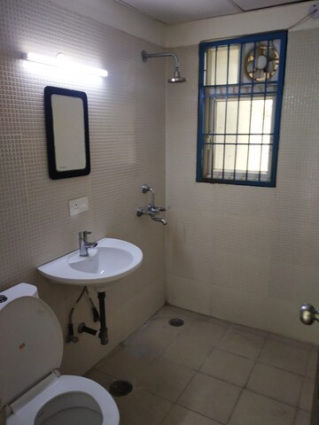 Bathroom in 2 BHK Apartment at Aditya Urban Casa, Sector 78 – for Rent