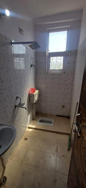 Bathroom in 3 BHK Builder Floor at Pratap Vihar – for Sale