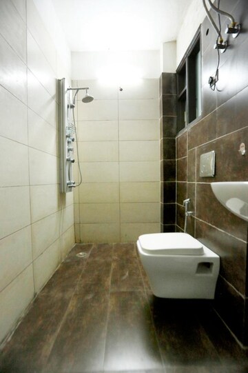 Bathroom in 4 BHK Builder Floor at Mayfield Garden – for Sale