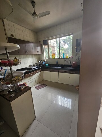 Kitchen in 3 BHK Apartment at Green Valley CHS, Wanwadi – for Rent