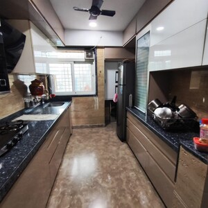 Kitchen in 2 BHK Apartment at Suyog CHS Naupada, Naupada – for Sale