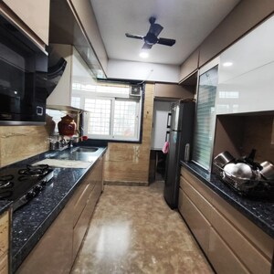 Kitchen in 2 BHK Apartment at Suyog CHS Naupada, Naupada – for Sale
