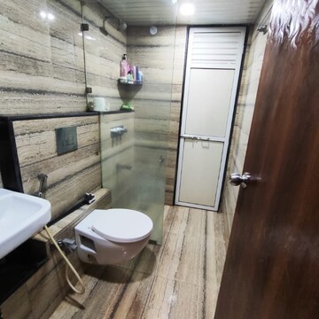 Bathroom in 2 BHK Apartment at Suyog CHS Naupada, Naupada – for Sale