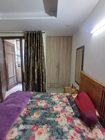 Bedroom in 3.5 BHK Builder Floor at Ramesh Nagar – for Rent