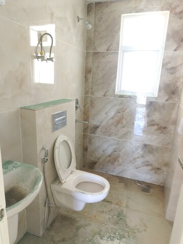 Bathroom in 3 BHK Apartment at Omaxe The Palace, Gomti Nagar – for Rent