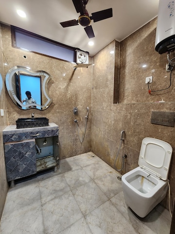Bathroom in 2 BHK Builder Floor at Chattarpur – for Rent