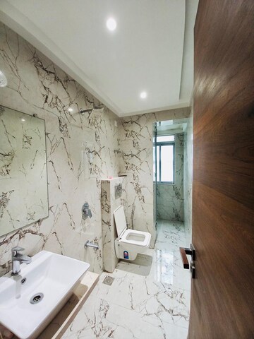 Bathroom in 4 BHK Apartment at Galaxy Aura, Nerul Sector 6 – for Sale