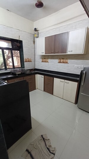 Kitchen in 2 BHK Apartment at Satellite Tower, Goregaon East – for Sale
