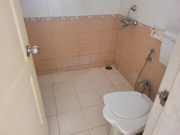 Bathroom in 2 BHK Apartment at Rohan Garima Phase II, Model Colony – for Sale